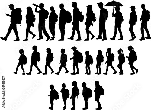 Silhouette people on a walk.