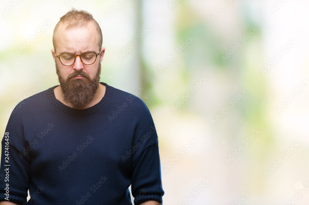 Young caucasian hipster man wearing sunglasses over isolated background depressed and worry for distress, crying angry and afraid. Sad expression. Young caucasian hipster man wearing sunglasses over isolated background depressed and worry for distress, crying angry and afraid. Sad expression.