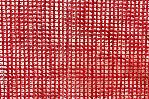 Red mesh fabric, close-up, background, texture