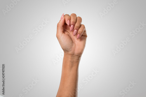 cute female hands over white background