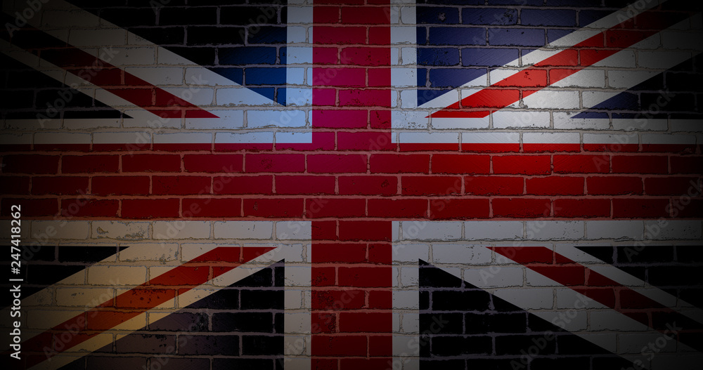 Fototapeta premium United Kingdom flag on the brick wall.
