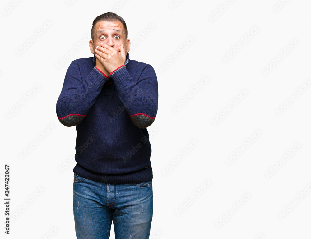 Middle age arab man over isolated background shocked covering mouth with hands for mistake. Secret concept. Middle age arab man over isolated background shocked covering mouth with hands for mistake. Secret concept.