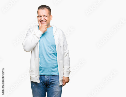 Middle age arab man wearing sweatshirt over isolated background looking confident at the camera with smile with crossed arms and hand raised on chin. Thinking positive.