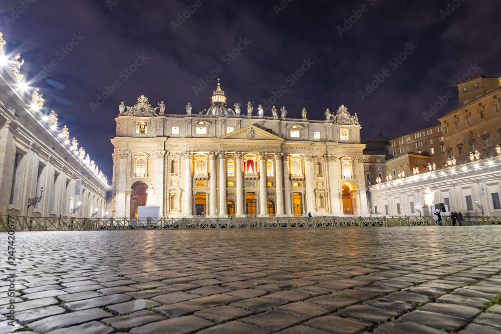 St. Peter's Cathedral on Saint Peter's square (Piazza San Pietro) in Vatican at night, center of Rome, Italy