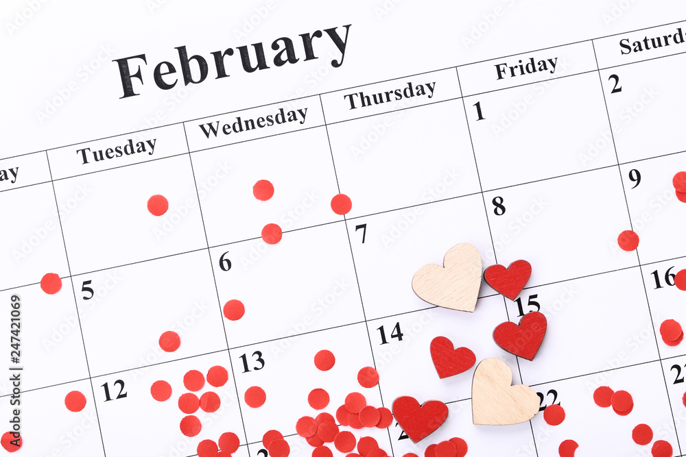 Valentine day calendar with wooden hearts and paper confetti Valentine day calendar with wooden hearts and paper confetti