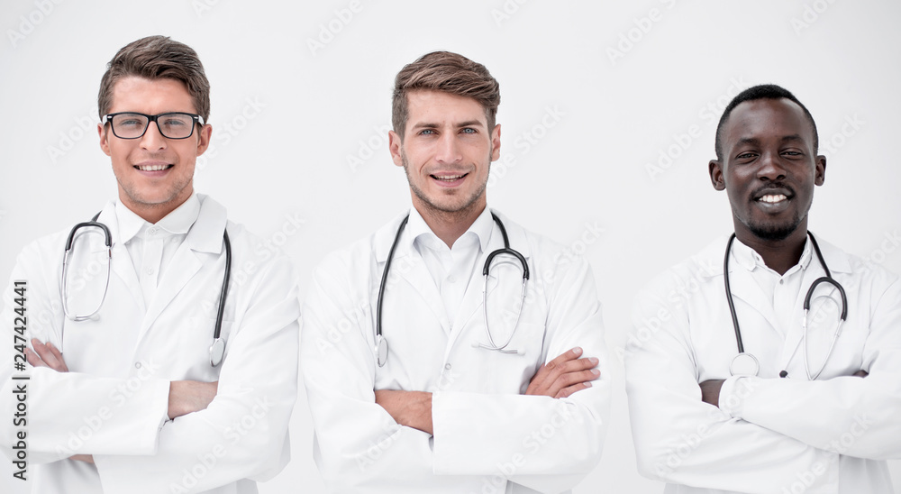 Fototapeta premium three successful physician therapists standing together