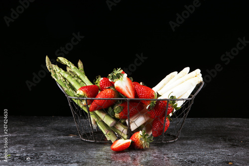 White and green asparagus with strawberries