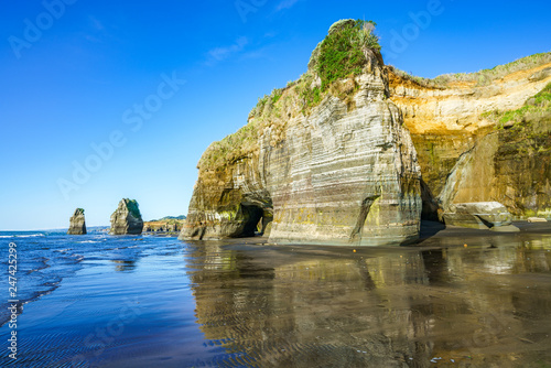 on the beach, 3 sisters and elephant rock, new zealand 15