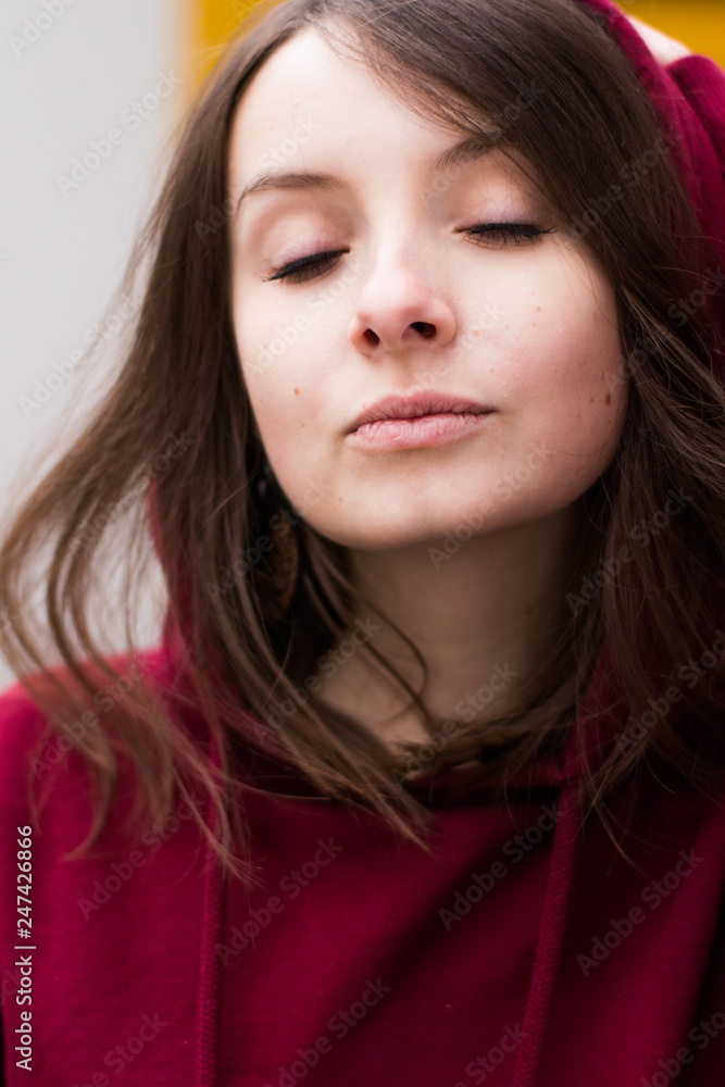 big eyes, sweet girl in burgundy hoodie, smiling and looking at you big eyes, sweet girl in burgundy hoodie, smiling and looking at you