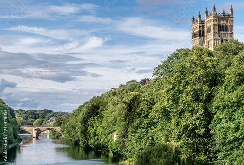 cathedral towers protruding above the forest next to the river Wear near Durham. 