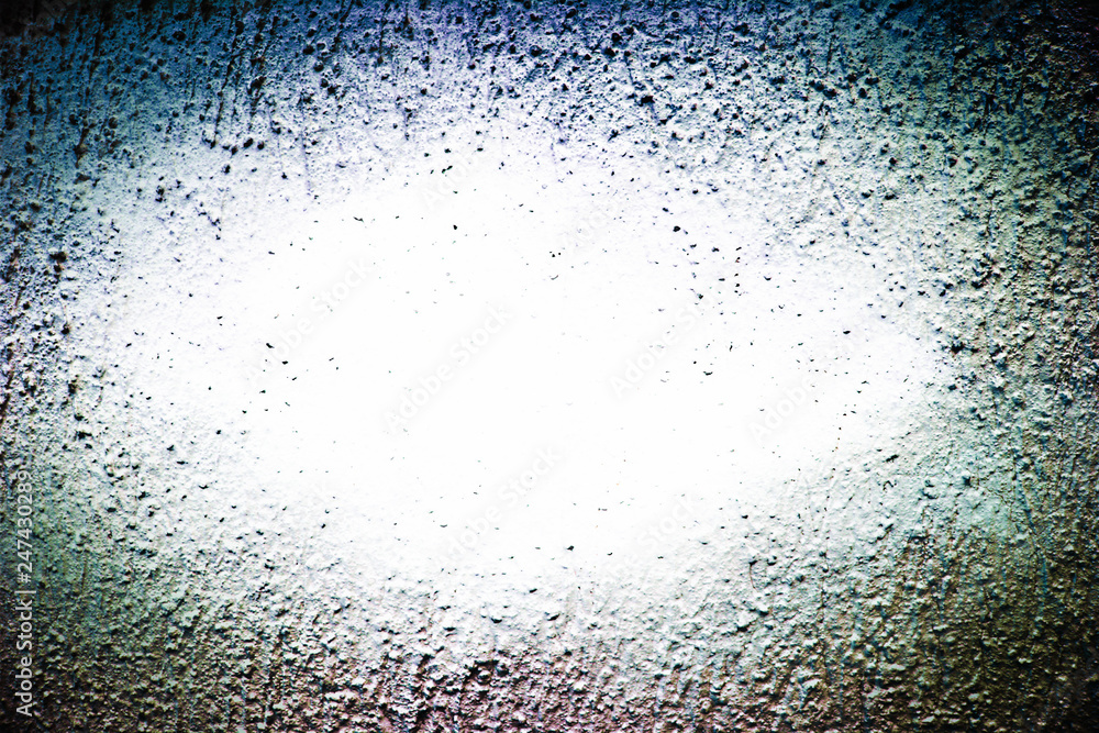 Obraz premium Cement wall rough facade with dark vignette and light center, copy space for text