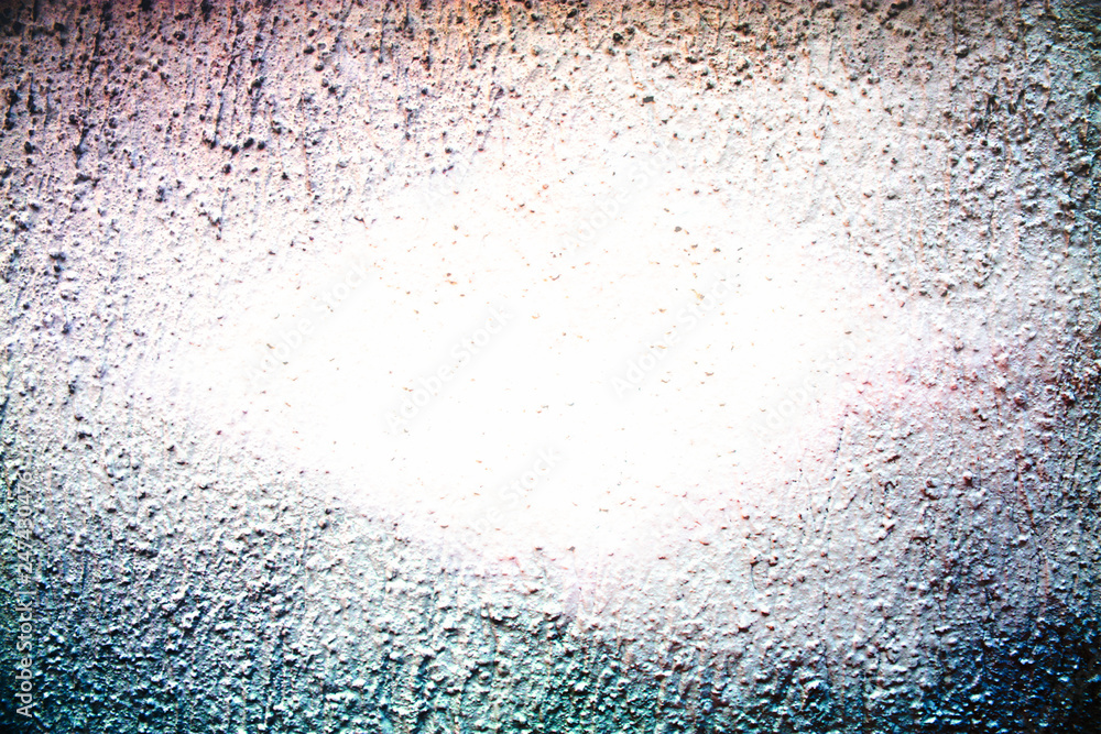 Cement wall rough facade with dark vignette and light center, copy space for text Cement wall rough facade with dark vignette and light center, copy space for text