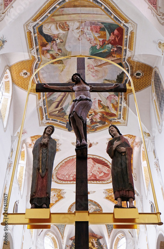 Virgin Mary and Saint John under the cross in the monastery church of St. John in Ursberg, Germany  photo