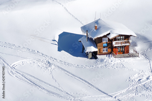фотографія Chalet covered with snow in the Transylvanian Alps, Romania, Europe