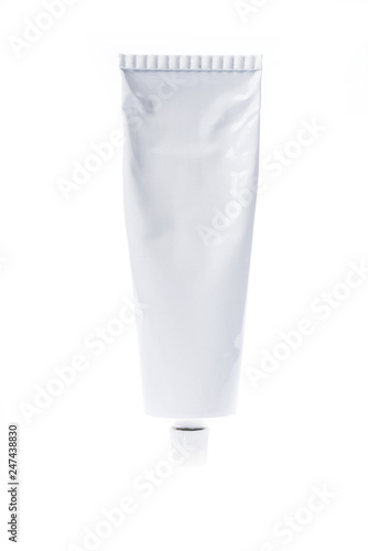 Close up of aluminum tube isolated on white background. Cosmetic or medicine gel.