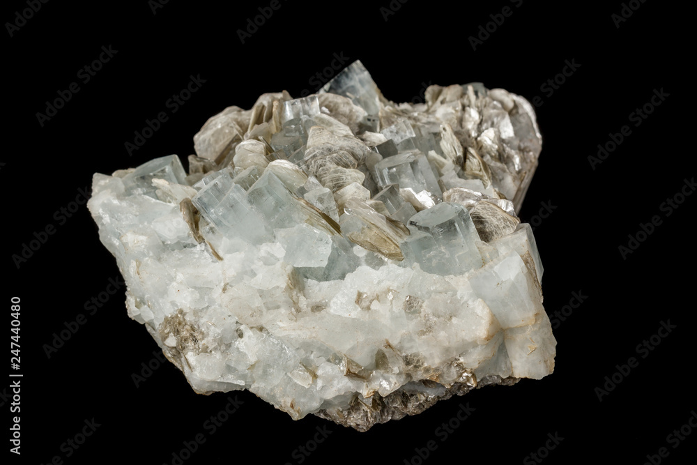 Macro mineral stone Aquamarine in rock on a black background Macro mineral stone Aquamarine in rock on a black background