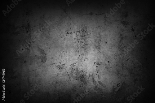 Black rough textured grunge concrete background. Dark edges