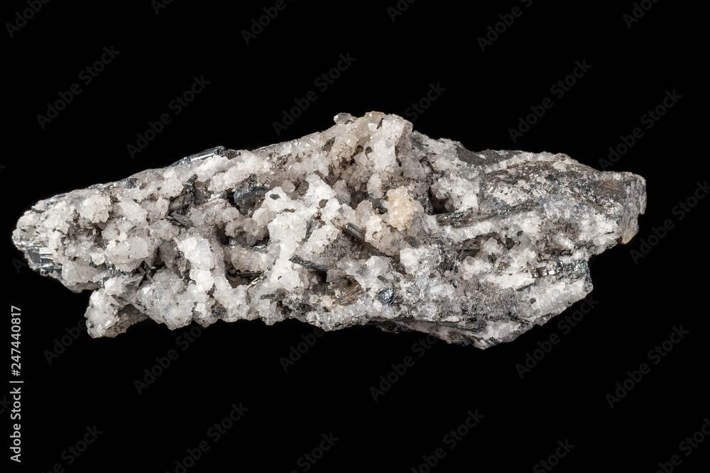 Macro mineral stone Stibnite quartz on a black background Macro mineral stone Stibnite quartz on a black background