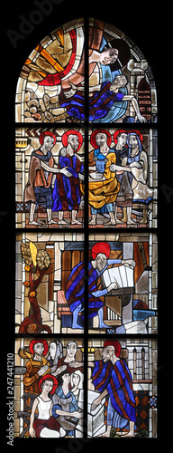 Scenes from the life of St. Paul  stained glass window in the parish church of St. Peter and Paul in Oberstaufen  Germany