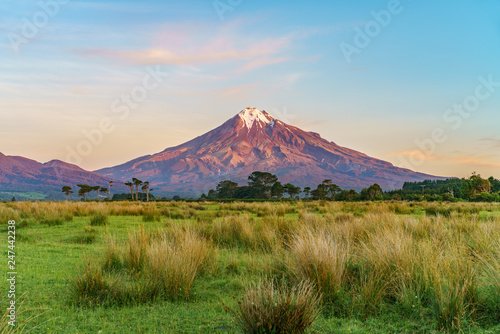sunset at cone volcano mount taranaki, new zealand 6