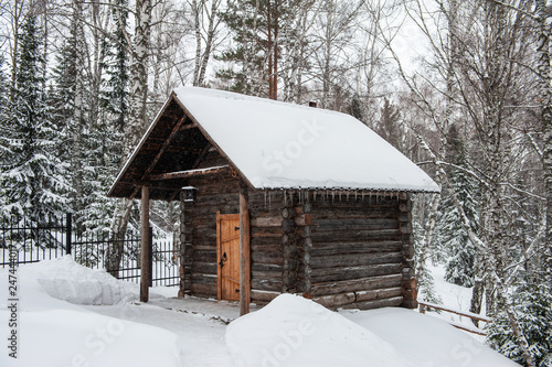 Antique wooden distillery house. Retro building of the early 19th century. © olinchuk