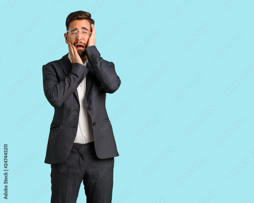 Young handsome business man desperate and sad Young handsome business man desperate and sad