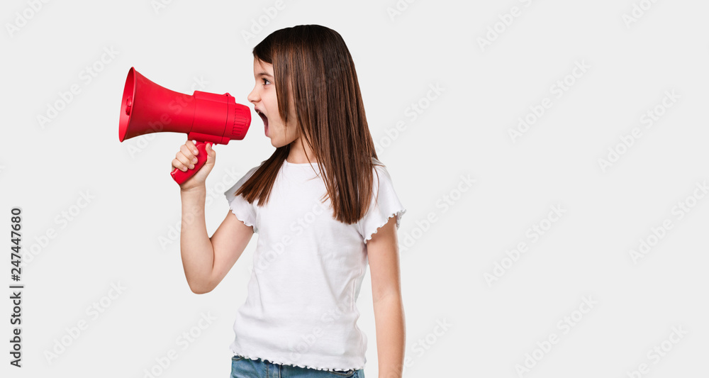 Full body little girl excited and euphoric, shouting with a megaphone, sign of revolution and change, encouraging other people to move, leader personality Full body little girl excited and euphoric, shouting with a megaphone, sign of revolution and change, encouraging other people to move, leader personality