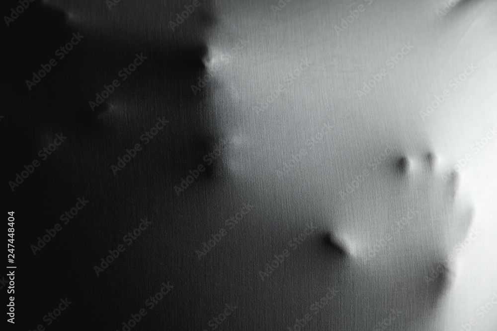 Screaming ghost face with hand. Scary and death concept Screaming ghost face with hand. Scary and death concept
