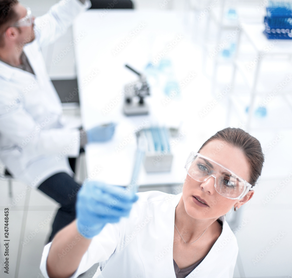 woman scientist working in a modern laboratory woman scientist working in a modern laboratory