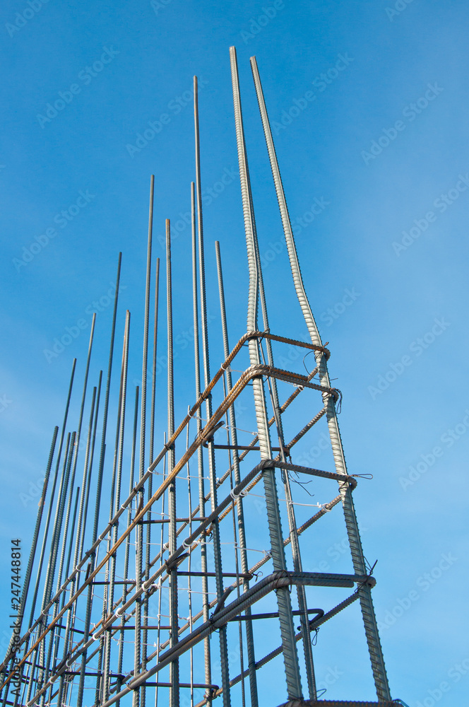 Part of the structural element of the reinforcement. Concrete work. Construction site. Construction of a new building. Part of the structural element of the reinforcement. Concrete work. Construction site. Construction of a new building.