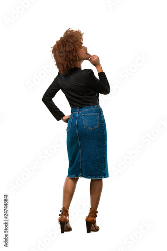 full body afro woman thinking over white photo