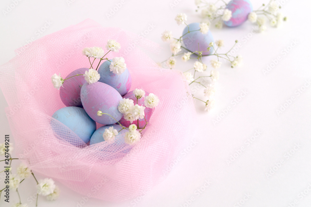 Easter color painted eggs on a white background. Easter color painted eggs on a white background.