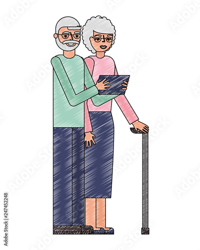 grandparents couple with tablet device and stick cane