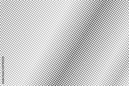 Rough dotted halftone with diagonal gradient. Black and white vector texture. Vintage effect graphic decor