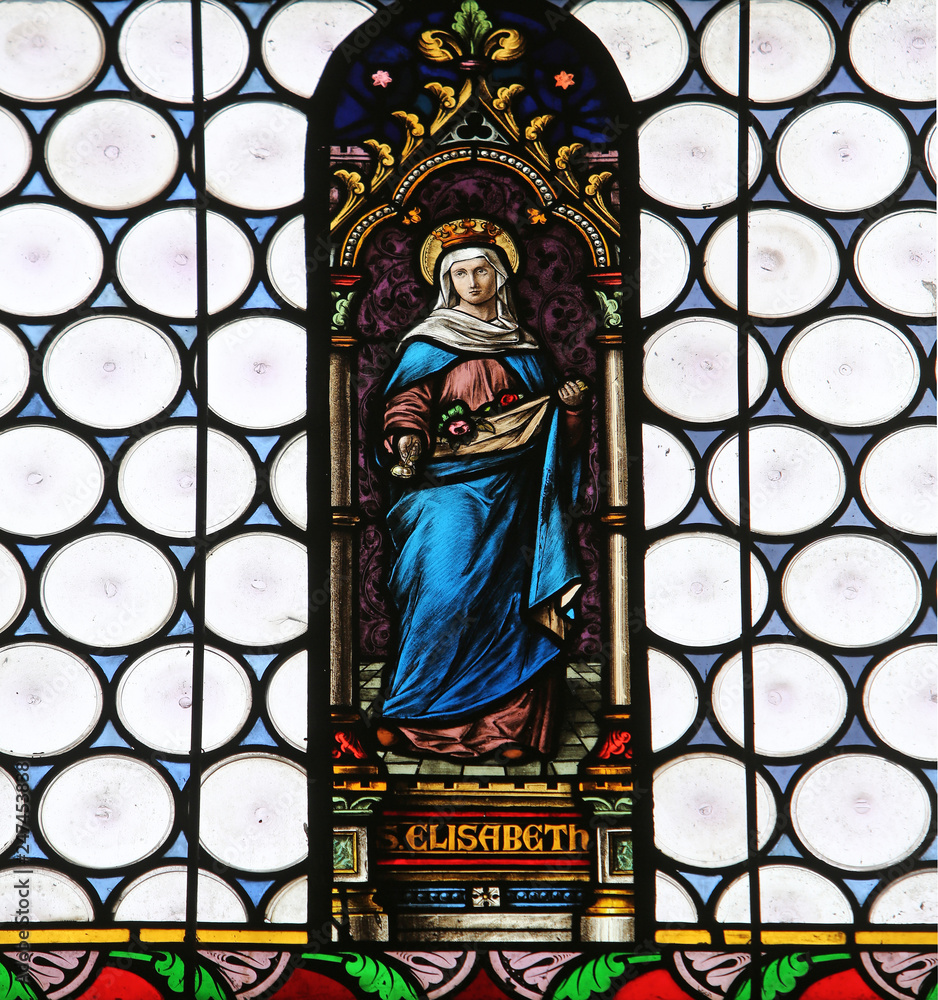 Saint Elizabeth, stained glass window in parish church of St. James in Hohenberg, Germany 