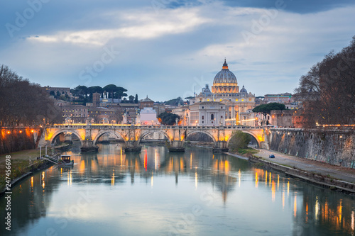 Saint Peter Basilica in Vatican city with Saint Angelo Bridge in Rome, Italy