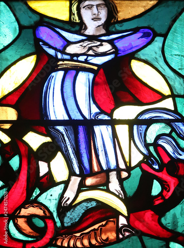 Madonna on the Crescent Moon  Stained glass window in Basilica of St. Vitus in Ellwangen  Germany 