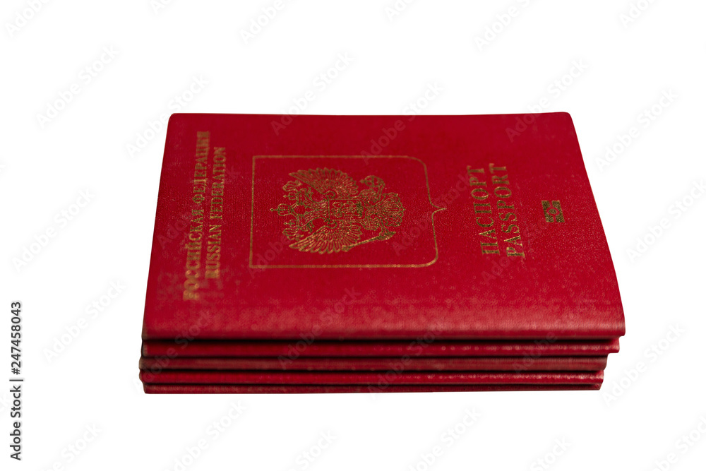 A stack of Russian passports isolated on white background A stack of Russian passports isolated on white background