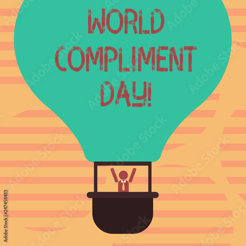 Word writing text World Compliment Day. Business concept for basic huanalysis need for recognition and appreciation day Hu analysis Dummy Arms Raising inside Gondola Riding Blank Color Air Balloon photo