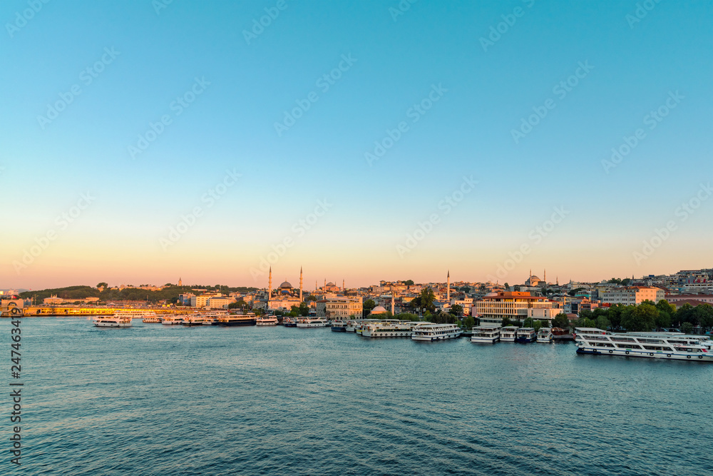 Scenic view of coastline of Istanbul and Eminonu pier at sunset