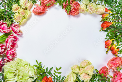 Froral pattern on white table background top view mockup