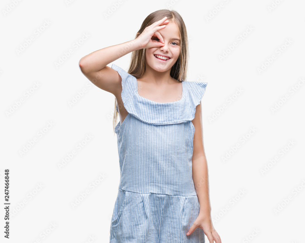 Young beautiful girl over isolated background doing ok gesture with hand smiling, eye looking through fingers with happy face. Young beautiful girl over isolated background doing ok gesture with hand smiling, eye looking through fingers with happy face.