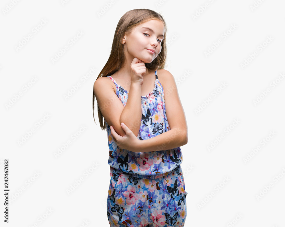 Young beautiful girl wearing colorful dress over isolated background with hand on chin thinking about question, pensive expression. Smiling with thoughtful face. Doubt concept. Young beautiful girl wearing colorful dress over isolated background with hand on chin thinking about question, pensive expression. Smiling with thoughtful face. Doubt concept.