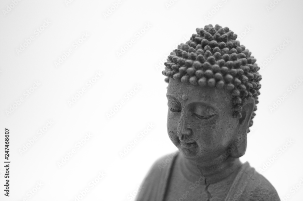 Buddha on white bright background