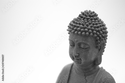 Buddha on white bright background