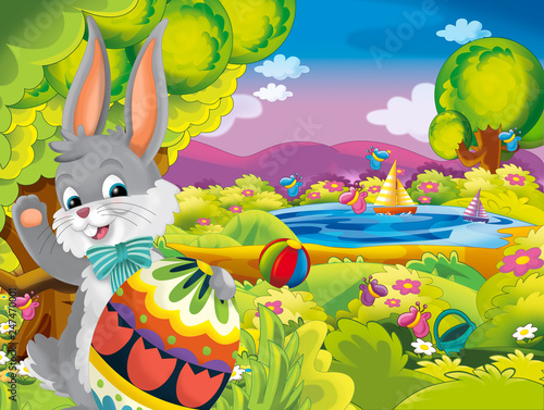 cartoon happy easter rabbit with beautiful easter egg on nature spring background - illustration for children © honeyflavour