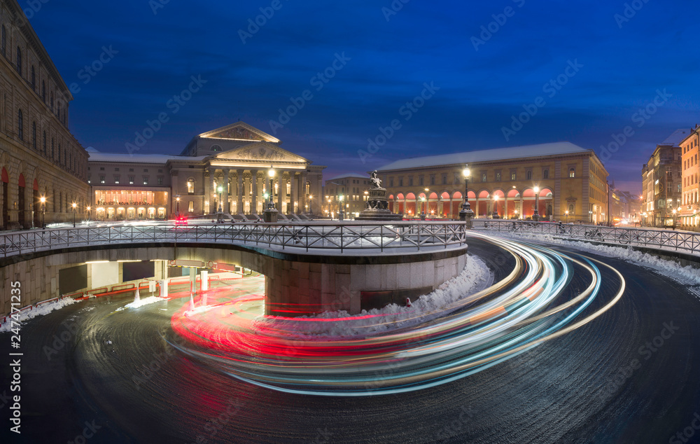 Fototapeta premium Light trails in front of Munich National theatre and Maximilian street at night