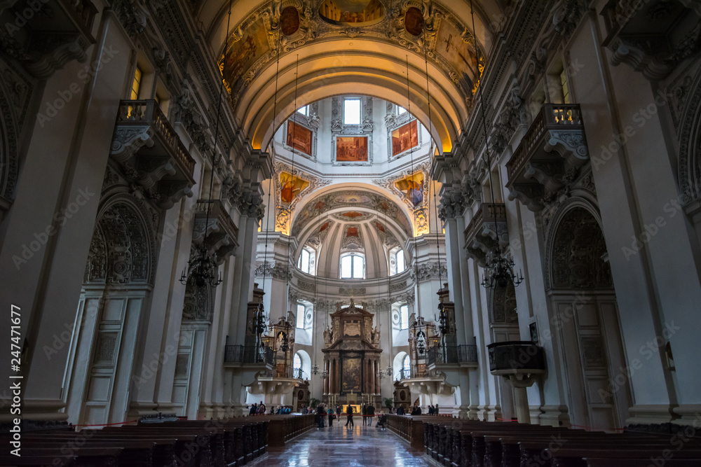 Salzburg, Austria - October, 07, 2018 - Tourists visit the interior of the Salzburg Cathedral.