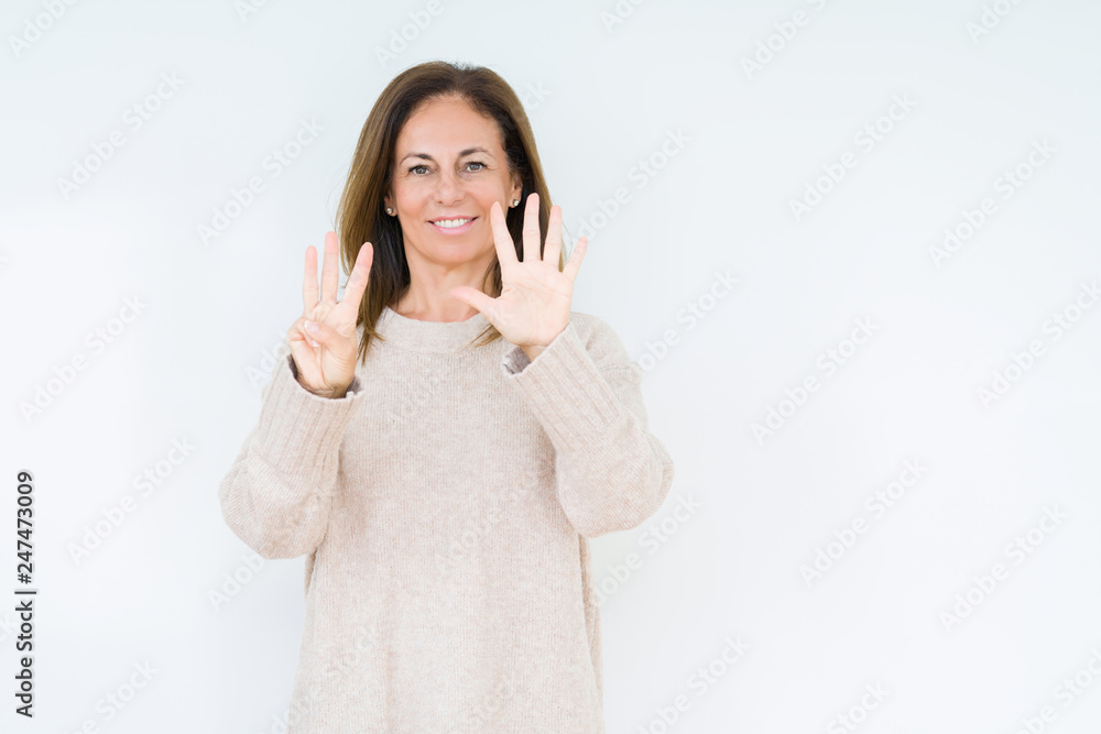 Beautiful middle age woman over isolated background showing and pointing up with fingers number eight while smiling confident and happy. Beautiful middle age woman over isolated background showing and pointing up with fingers number eight while smiling confident and happy.