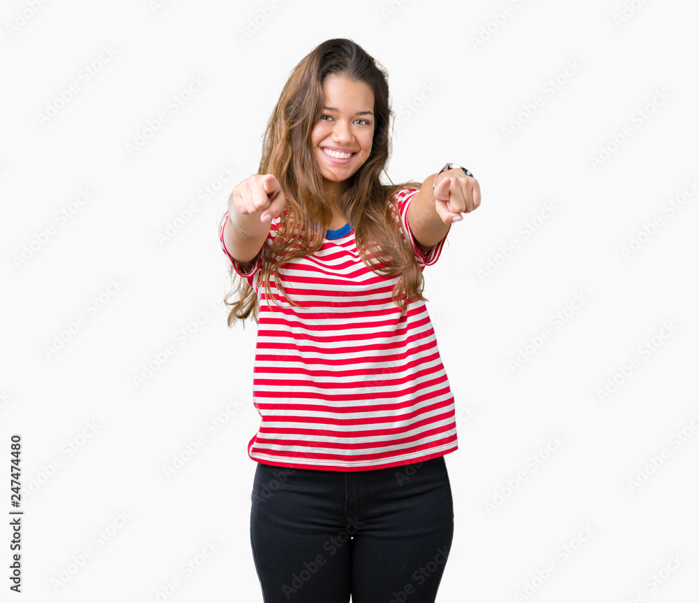 Young beautiful brunette woman wearing stripes t-shirt over isolated background Pointing to you and the camera with fingers, smiling positive and cheerful Young beautiful brunette woman wearing stripes t-shirt over isolated background Pointing to you and the camera with fingers, smiling positive and cheerful
